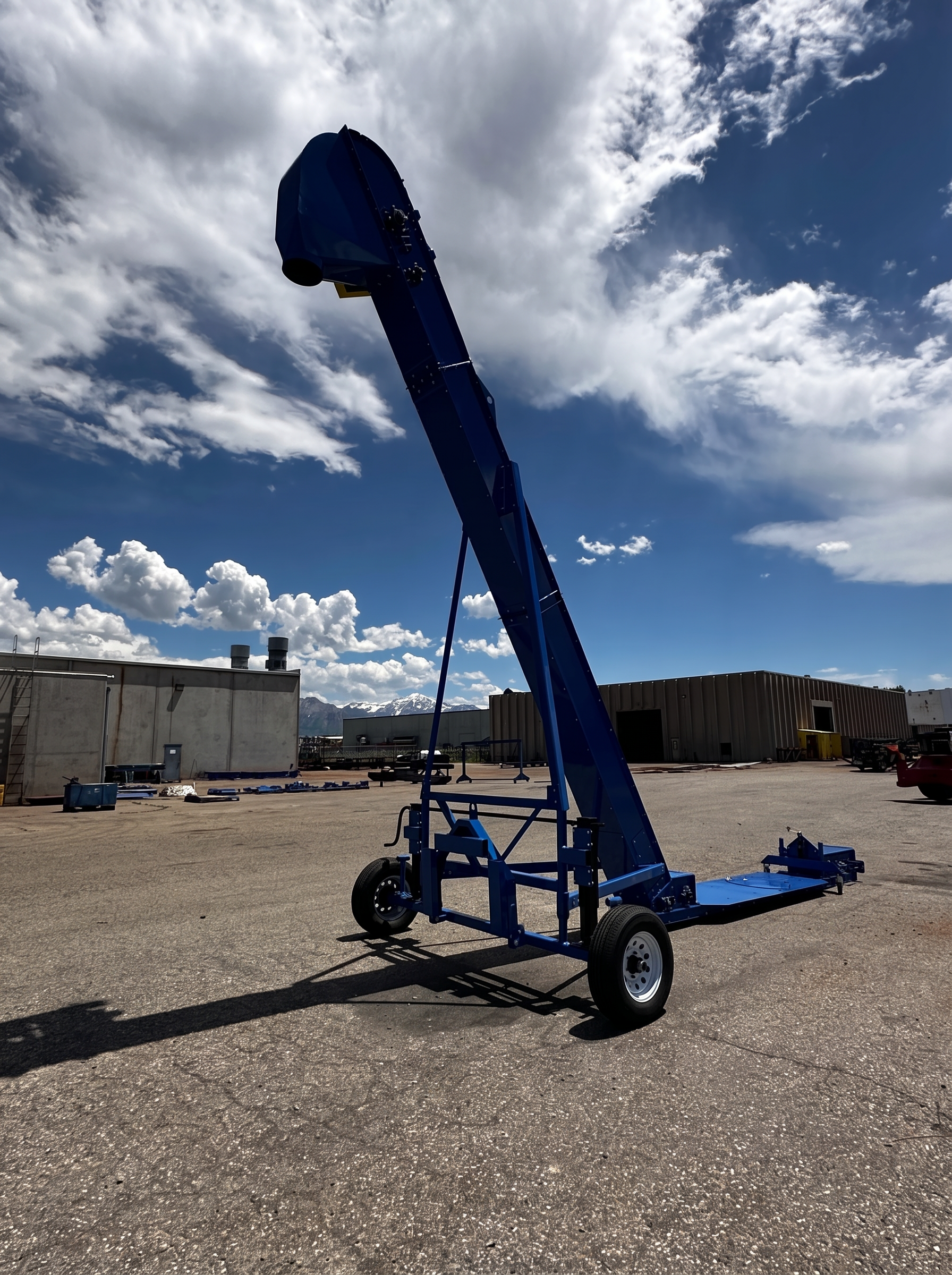 Scorpion 2410 portable transloader with its boom raised, parked at the Cambelt facility