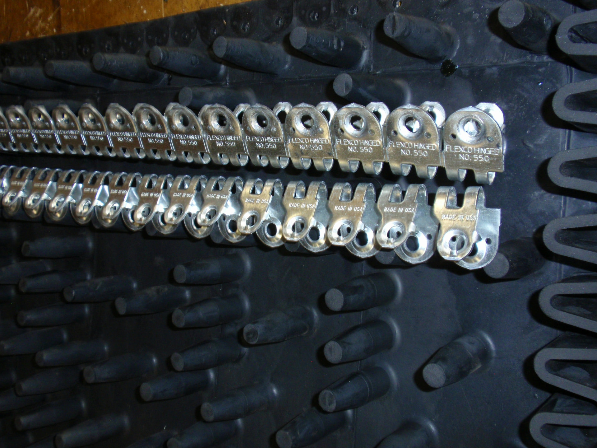 Flexco hinged fasteners installed on heavy-duty conveyor belting