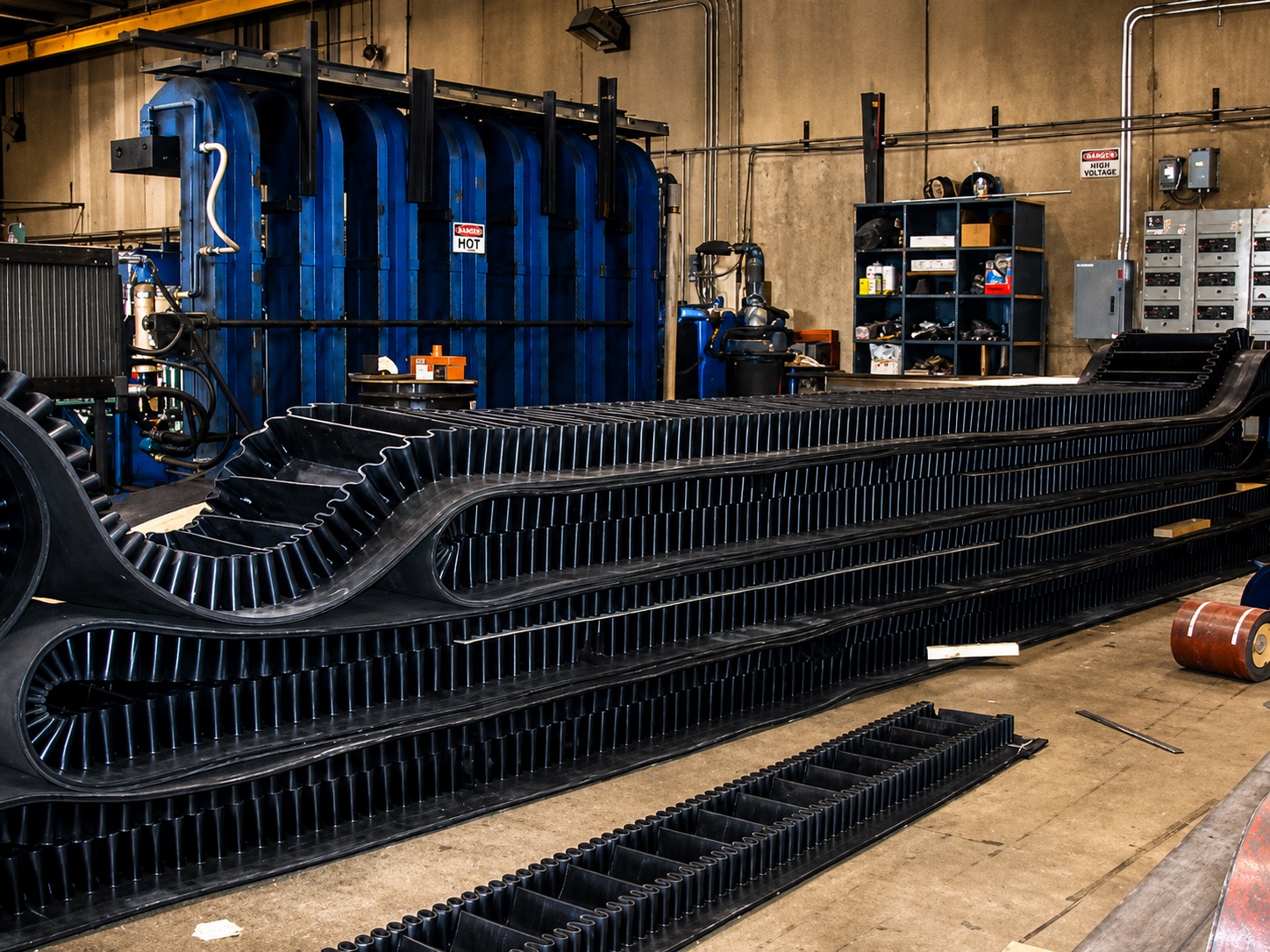 Material moving through a heavy industrial conveyor system